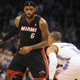 Feb 20, 2014; Oklahoma City, OK, USA; Miami Heat small forward LeBron James (6) handles the ball against Oklahoma City Thunder point guard R Feb 20, 2014; Oklahoma City, OK, USA; Miami Heat small forward LeBron James (6) handles the ball against Oklahoma City Thunder point guard R