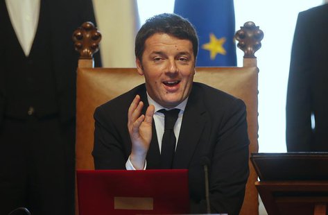 Newly appointed Italian Prime Minister Matteo Renzi attends his first cabinet meeting at Chigi Palace in Rome February 22, 2014. REUTERS/Ton Newly appointed Italian Prime Minister Matteo Renzi attends his first cabinet meeting at Chigi Palace in Rome February 22, 2014. REUTERS/Ton