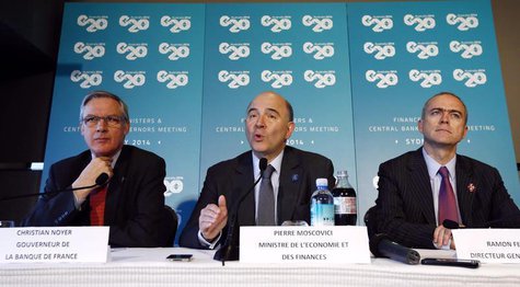 French Economic Minister Pierre Moscovici (C) speaks alongside France's Central Bank Governor Christian Noyer and General Director of Treasu French Economic Minister Pierre Moscovici (C) speaks alongside France's Central Bank Governor Christian Noyer and General Director of Treasu
