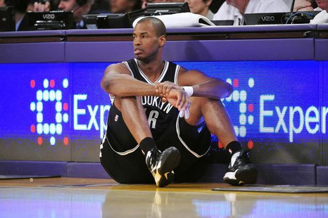 February 23, 2014; Los Angeles, CA, USA; Brooklyn Nets center Jason Collins (46) waits to enter the game against the Los Angeles Lakers duri February 23, 2014; Los Angeles, CA, USA; Brooklyn Nets center Jason Collins (46) waits to enter the game against the Los Angeles Lakers duri