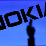 A photo illustration of a man silhouetted against a Nokia logo in the central Bosnian town of Zenica January 23, 2014. REUTERS/Dado Ruvic A photo illustration of a man silhouetted against a Nokia logo in the central Bosnian town of Zenica January 23, 2014. REUTERS/Dado Ruvic