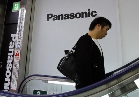 A man walks past Panasonic Corp's logos at an electronics store in Tokyo October 31, 2013. REUTERS/Toru Hanai A man walks past Panasonic Corp's logos at an electronics store in Tokyo October 31, 2013. REUTERS/Toru Hanai