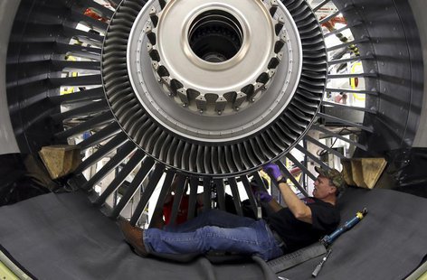 General Electric employee Jim Jones assembles a GE90 engine at the GE Aviation Peebles Test Operations Facility in Peebles, Ohio, November 1 General Electric employee Jim Jones assembles a GE90 engine at the GE Aviation Peebles Test Operations Facility in Peebles, Ohio, November 1
