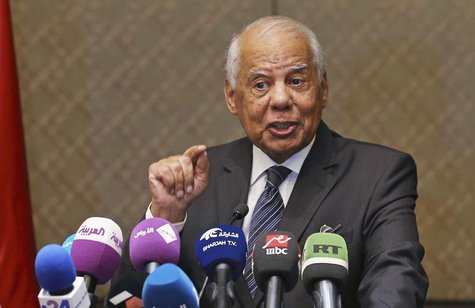 Egypt's Prime Minister Hazem el-Beblawi gestures during a news conference in Abu Dhabi October 27, 2013. REUTERS/Ben Job Egypt's Prime Minister Hazem el-Beblawi gestures during a news conference in Abu Dhabi October 27, 2013. REUTERS/Ben Job