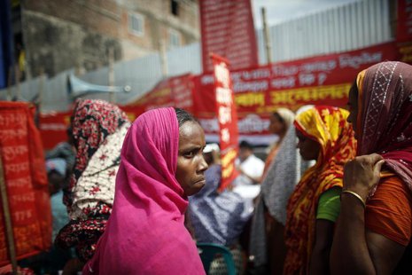 Garment workers who survived the Rana Plaza building collapse take part in a protest to demand for compensation, on the six month anniversar Garment workers who survived the Rana Plaza building collapse take part in a protest to demand for compensation, on the six month anniversar