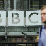 A pedestrian walks past a BBC logo at Broadcasting House in central London October 22, 2012. REUTERS/Olivia Harris A pedestrian walks past a BBC logo at Broadcasting House in central London October 22, 2012. REUTERS/Olivia Harris