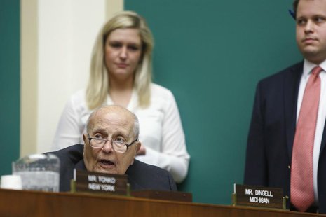 U.S. Representative John Dingell (D-MI) (seated, L) speaks during a hearing about the security of the HealthCare.gov website before the Hous U.S. Representative John Dingell (D-MI) (seated, L) speaks during a hearing about the security of the HealthCare.gov website before the Hous