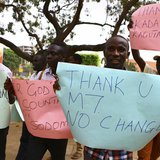 Anti-gay supporters celebrate after Uganda's President Yoweri Museveni signed a law imposing harsh penalties for homosexuality in Kampala Fe Anti-gay supporters celebrate after Uganda's President Yoweri Museveni signed a law imposing harsh penalties for homosexuality in Kampala Fe