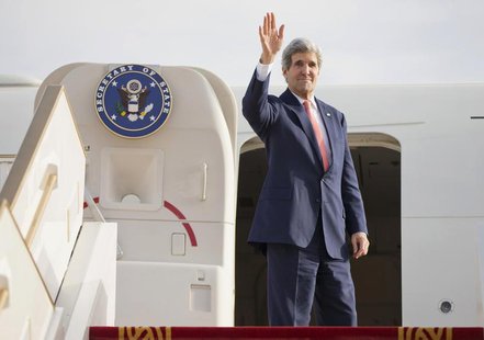 U.S. Secretary of State John Kerry waves as he departs Abu Dhabi International Airport February 18, 2014. REUTERS/Evan Vucci/Pool U.S. Secretary of State John Kerry waves as he departs Abu Dhabi International Airport February 18, 2014. REUTERS/Evan Vucci/Pool