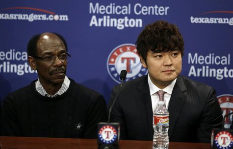 Dec 27, 2013; Arlington, TX, USA; Texas Rangers manager Ron Washington (left) and outfielder Shin-Soo Choo (right) talk to the media during Dec 27, 2013; Arlington, TX, USA; Texas Rangers manager Ron Washington (left) and outfielder Shin-Soo Choo (right) talk to the media during