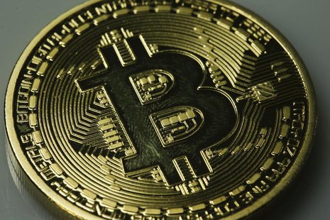 A mock Bitcoin is displayed on a table in an illustration picture taken in Berlin January 7, 2014.REUTERS/Pawel Kopczynski A mock Bitcoin is displayed on a table in an illustration picture taken in Berlin January 7, 2014.REUTERS/Pawel Kopczynski