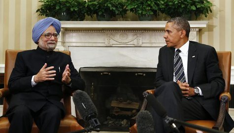 Indian Prime Minister Manmohan Singh (L) speaks as U.S. President Barack Obama looks on, during their meeting in the Oval Office of the Whit Indian Prime Minister Manmohan Singh (L) speaks as U.S. President Barack Obama looks on, during their meeting in the Oval Office of the Whit