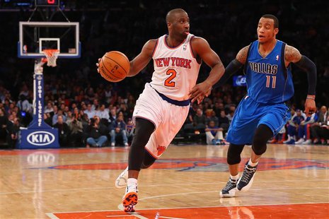 Feb 24, 2014; New York, NY, USA; New York Knicks point guard Raymond Felton (2) dribbles the ball in front of Dallas Mavericks shooting guar Feb 24, 2014; New York, NY, USA; New York Knicks point guard Raymond Felton (2) dribbles the ball in front of Dallas Mavericks shooting guar