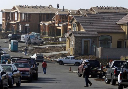 People walk near new single family homes under construction in San Marcos, California October 25, 2013. REUTERS/Mike Blake People walk near new single family homes under construction in San Marcos, California October 25, 2013. REUTERS/Mike Blake