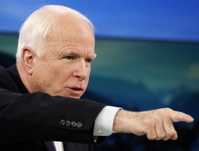 U.S. Senator John McCain gestures during a session at the annual meeting of the World Economic Forum (WEF) in Davos January 24, 2014. REUTER U.S. Senator John McCain gestures during a session at the annual meeting of the World Economic Forum (WEF) in Davos January 24, 2014. REUTER