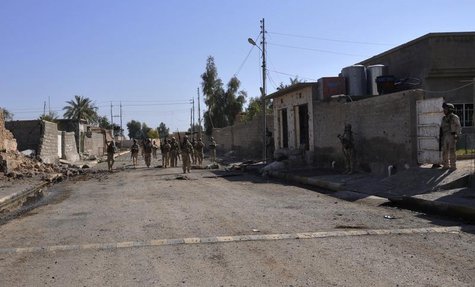 Iraqi soldiers take their positions during a patrol in Sulaiman Pek, 160 km (99 miles) north of Baghdad, February 21, 2014 file photo. REUTE Iraqi soldiers take their positions during a patrol in Sulaiman Pek, 160 km (99 miles) north of Baghdad, February 21, 2014 file photo. REUTE