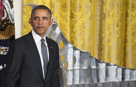 U.S. President Barack Obama stands after delivering remarks on manufacturing innovation institutes in the East Room of the White House in Wa U.S. President Barack Obama stands after delivering remarks on manufacturing innovation institutes in the East Room of the White House in Wa