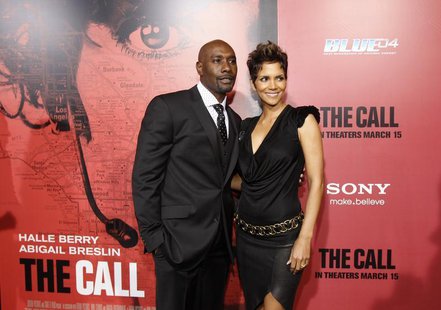 Cast member Halle Berry (R) poses with co-star Morris Chestnut at the premiere of "The Call" in Los Angeles, California March 5, 2013. REUTE Cast member Halle Berry (R) poses with co-star Morris Chestnut at the premiere of "The Call" in Los Angeles, California March 5, 2013. REUTE