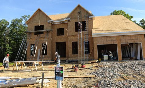 Carpenter's work on a housing site at Mid-Atlantic Builders "The Villages of Savannah" development in Brandywine, Maryland May 31, 2013. REU Carpenter's work on a housing site at Mid-Atlantic Builders "The Villages of Savannah" development in Brandywine, Maryland May 31, 2013. REU