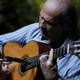 Spanish flamenco guitarist Paco de Lucia plays a guitar during a rehearsal of closing concert of the Biennial of Flamenco in the Andalusian Spanish flamenco guitarist Paco de Lucia plays a guitar during a rehearsal of closing concert of the Biennial of Flamenco in the Andalusian