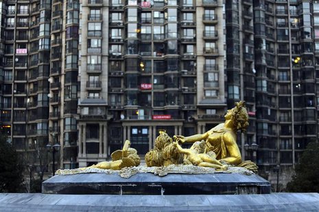 A sculpture is seen in front of an apartment block in Beijing January 16, 2014. REUTERS/Jason Lee A sculpture is seen in front of an apartment block in Beijing January 16, 2014. REUTERS/Jason Lee