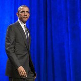 President Barack Obama walks after delivering remarks at Organizing for Action's "National Organizing Summit" in Washington February 25, 201 President Barack Obama walks after delivering remarks at Organizing for Action's "National Organizing Summit" in Washington February 25, 201