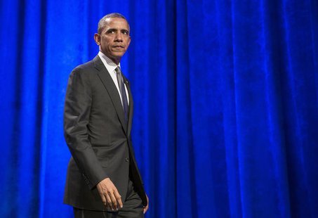 President Barack Obama walks after delivering remarks at Organizing for Action's "National Organizing Summit" in Washington February 25, 201 President Barack Obama walks after delivering remarks at Organizing for Action's "National Organizing Summit" in Washington February 25, 201