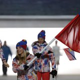 Liechtenstein's flag-bearer Tina Weirather leads her country's contingent during the athletes' parade at the opening ceremony of the 2014 So Liechtenstein's flag-bearer Tina Weirather leads her country's contingent during the athletes' parade at the opening ceremony of the 2014 So
