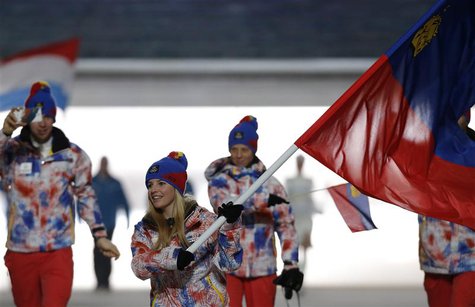 Liechtenstein's flag-bearer Tina Weirather leads her country's contingent during the athletes' parade at the opening ceremony of the 2014 So Liechtenstein's flag-bearer Tina Weirather leads her country's contingent during the athletes' parade at the opening ceremony of the 2014 So