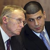 Aaron Hernandez (R) chats with his lawyer Charles Rankin as he appears for a pre-trial hearing at Bristol County Superior Court in Fall Rive Aaron Hernandez (R) chats with his lawyer Charles Rankin as he appears for a pre-trial hearing at Bristol County Superior Court in Fall Rive