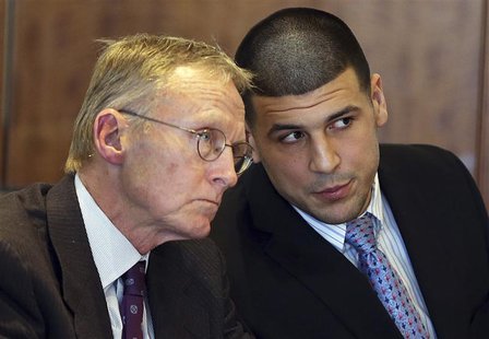 Aaron Hernandez (R) chats with his lawyer Charles Rankin as he appears for a pre-trial hearing at Bristol County Superior Court in Fall Rive Aaron Hernandez (R) chats with his lawyer Charles Rankin as he appears for a pre-trial hearing at Bristol County Superior Court in Fall Rive