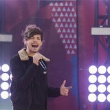 Singer Louis Tomlinson of the band One Direction performs on ABC's Good Morning America inside Central Park in New York, November 26, 2013. Singer Louis Tomlinson of the band One Direction performs on ABC's Good Morning America inside Central Park in New York, November 26, 2013.
