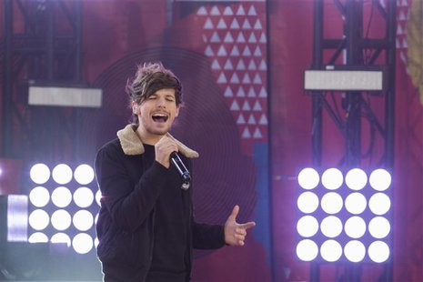 Singer Louis Tomlinson of the band One Direction performs on ABC's Good Morning America inside Central Park in New York, November 26, 2013. Singer Louis Tomlinson of the band One Direction performs on ABC's Good Morning America inside Central Park in New York, November 26, 2013.