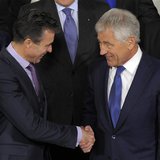 U.S. Secretary of Defense Chuck Hagel (R) shakes hands with NATO Secretary-General Anders Fogh Rasmussen during a NATO defence ministers' me U.S. Secretary of Defense Chuck Hagel (R) shakes hands with NATO Secretary-General Anders Fogh Rasmussen during a NATO defence ministers' me