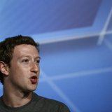Facebook Chief Executive Officer Mark Zuckerberg smiles in the stage before delivering a keynote speech during the Mobile World Congress in Facebook Chief Executive Officer Mark Zuckerberg smiles in the stage before delivering a keynote speech during the Mobile World Congress in