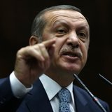 Turkey's Prime Minister Tayyip Erdogan addresses members of parliament from his ruling AK Party (AKP) during a meeting at the Turkish parlia Turkey's Prime Minister Tayyip Erdogan addresses members of parliament from his ruling AK Party (AKP) during a meeting at the Turkish parlia