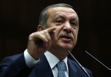 Turkey's Prime Minister Tayyip Erdogan addresses members of parliament from his ruling AK Party (AKP) during a meeting at the Turkish parlia Turkey's Prime Minister Tayyip Erdogan addresses members of parliament from his ruling AK Party (AKP) during a meeting at the Turkish parlia