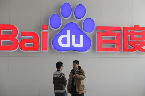People talk in front of a Baidu's company logo at Baidu's headquarters in Beijing January 16, 2014. REUTERS/Jason Lee People talk in front of a Baidu's company logo at Baidu's headquarters in Beijing January 16, 2014. REUTERS/Jason Lee