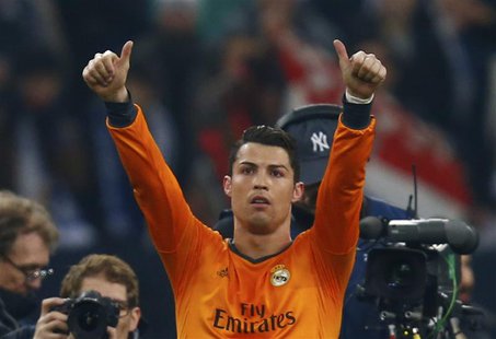 Real Madrid's Cristiano Ronaldo reacts after their Champions League soccer match against Schalke 04 in Gelsenkirchen February 26, 2014. REUT Real Madrid's Cristiano Ronaldo reacts after their Champions League soccer match against Schalke 04 in Gelsenkirchen February 26, 2014. REUT