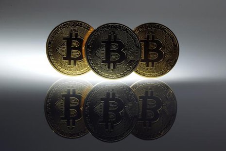 Mock Bitcoins are displayed on a table in an illustration picture taken in Berlin January 7, 2014.
CREDIT: REUTERS/PAWEL KOPCZYNSKI Mock Bitcoins are displayed on a table in an illustration picture taken in Berlin January 7, 2014.
CREDIT: REUTERS/PAWEL KOPCZYNSKI