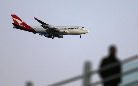 A Qantas Boeing 747 prepares to land at Kingsford Smith international aiport in Sydney August 20, 2013. REUTERS/Daniel Munoz A Qantas Boeing 747 prepares to land at Kingsford Smith international aiport in Sydney August 20, 2013. REUTERS/Daniel Munoz