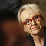 Arizona Governor Jan Brewer looks up as U.S. President Barack Obama addresses the National Governors Association in the State Dining Room of Arizona Governor Jan Brewer looks up as U.S. President Barack Obama addresses the National Governors Association in the State Dining Room of