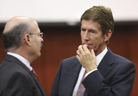 Defense counsel Mark O'Mara (R), talks to prosecutor Bernie de la Rionda during George Zimmerman's trial in Seminole circuit court in Sanfor Defense counsel Mark O'Mara (R), talks to prosecutor Bernie de la Rionda during George Zimmerman's trial in Seminole circuit court in Sanfor