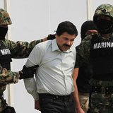Joaquin "Shorty" Guzman (C) is escorted by soldiers during a presentation at the Navy's airstrip in Mexico City February 22, 2014. REUTERS/H Joaquin "Shorty" Guzman (C) is escorted by soldiers during a presentation at the Navy's airstrip in Mexico City February 22, 2014. REUTERS/H