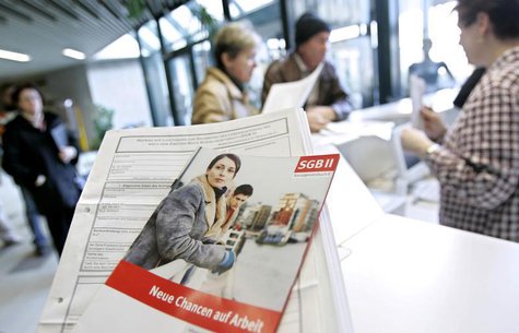 A flyer advertises for "new chances for a job" in a Federal Labour Office job centre in the western German town of Essen. REUTERS/Kirsten Ne A flyer advertises for "new chances for a job" in a Federal Labour Office job centre in the western German town of Essen. REUTERS/Kirsten Ne