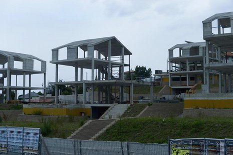 Partially constructed houses are seen in the Basque coastal town of Zarautz June 10, 2012. REUTERS/Vincent West Partially constructed houses are seen in the Basque coastal town of Zarautz June 10, 2012. REUTERS/Vincent West