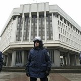 Interior Ministry members stand guard near the Crimean parliament building in Simferopol February 27, 2014. REUTERS/David Mdzinarishvili Interior Ministry members stand guard near the Crimean parliament building in Simferopol February 27, 2014. REUTERS/David Mdzinarishvili