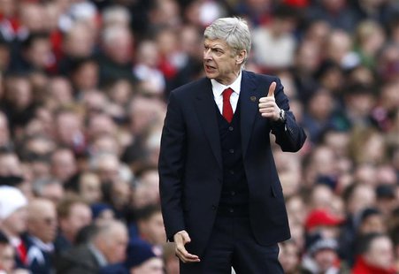 Arsenal's manager Arsene Wenger gestures during their English Premier League soccer match against Sunderland at the Emirates Stadium in Lond Arsenal's manager Arsene Wenger gestures during their English Premier League soccer match against Sunderland at the Emirates Stadium in Lond