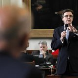 Texas state Republican Senator Dan Patrick (R) speaks as state Democratic Senator John Whitmire (L, in foreground) listens during a meeting Texas state Republican Senator Dan Patrick (R) speaks as state Democratic Senator John Whitmire (L, in foreground) listens during a meeting