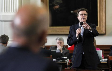 Texas state Republican Senator Dan Patrick (R) speaks as state Democratic Senator John Whitmire (L, in foreground) listens during a meeting Texas state Republican Senator Dan Patrick (R) speaks as state Democratic Senator John Whitmire (L, in foreground) listens during a meeting